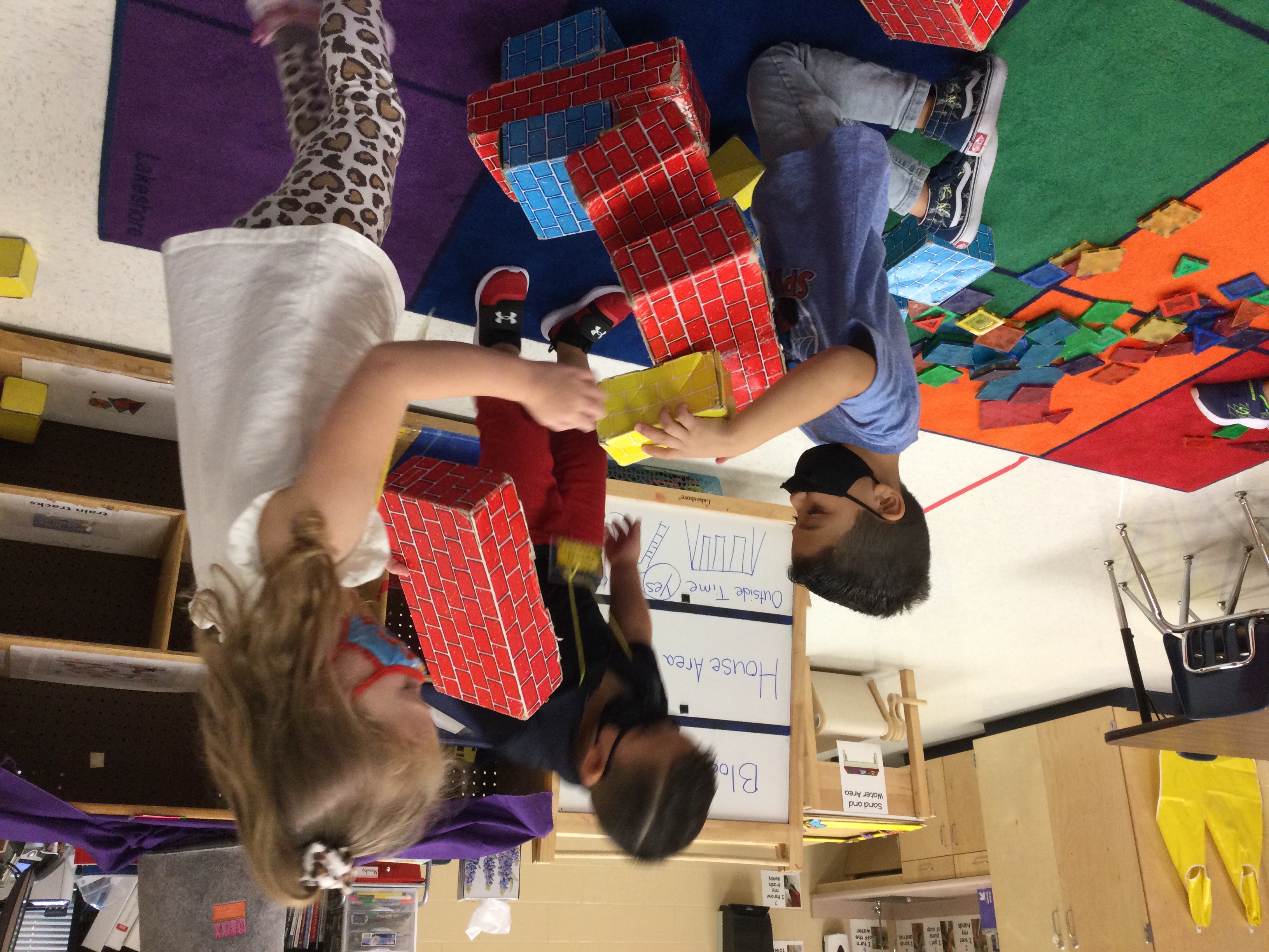 Students playing with blocks