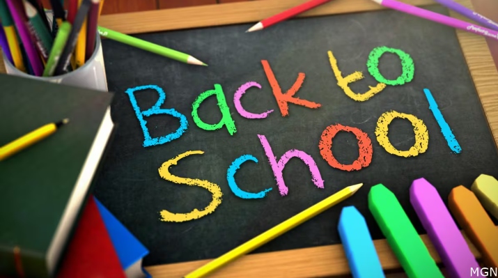 A colorful Back to School poster on a black board. 