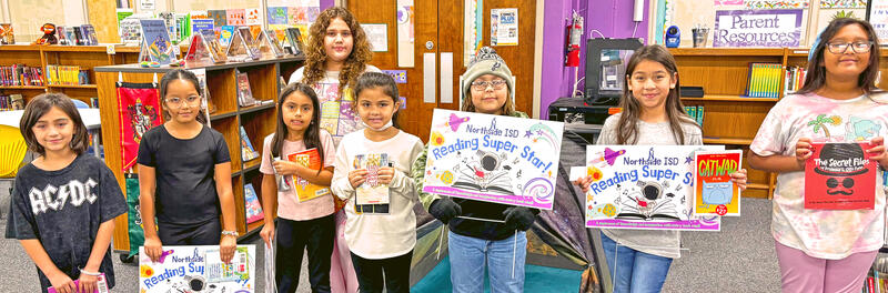 Meadow Village Students in library