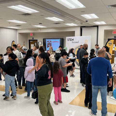 Students and families learning about middle school magnet programs at our recent magnet fair. Applications for magnet schools are due on January 21.